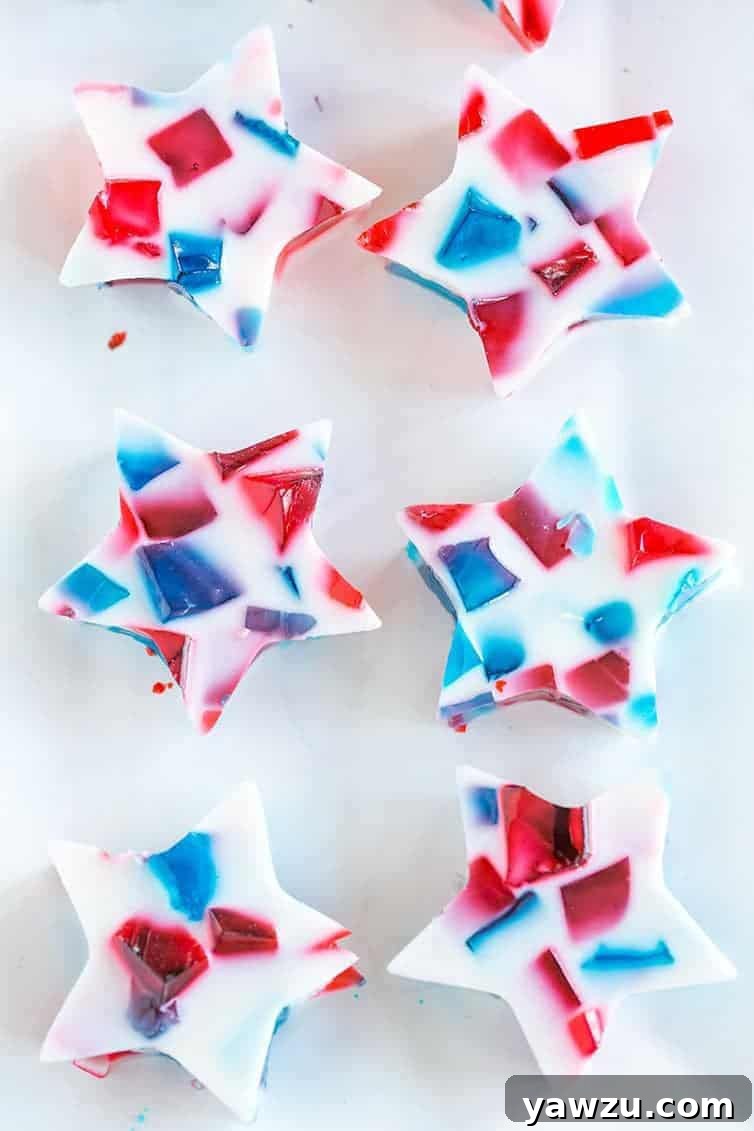 A tray of red, white and blue stained glass Jello stars.