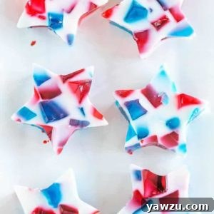 A tray of red, white and blue stained glass Jello stars.