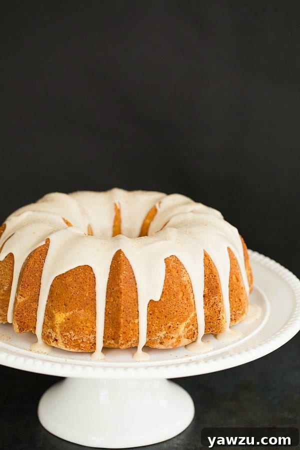 Delicious Eggnog Bundt Cake with Rum Icing, perfect for holiday gatherings. Features a rich, creamy, and spiced flavor profile.