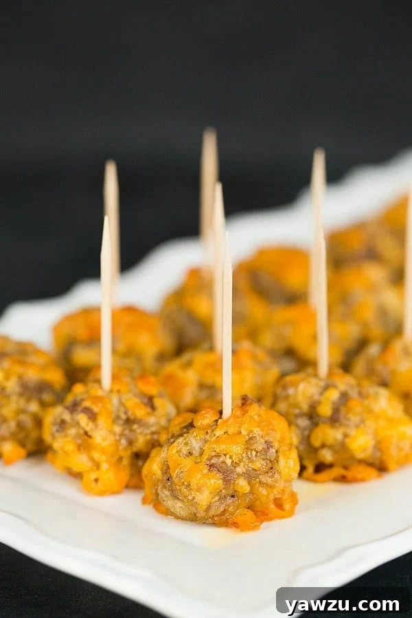 Delicious Sausage Cheddar Bites - The ultimate easy appetizer for Super Bowl parties and any gathering!