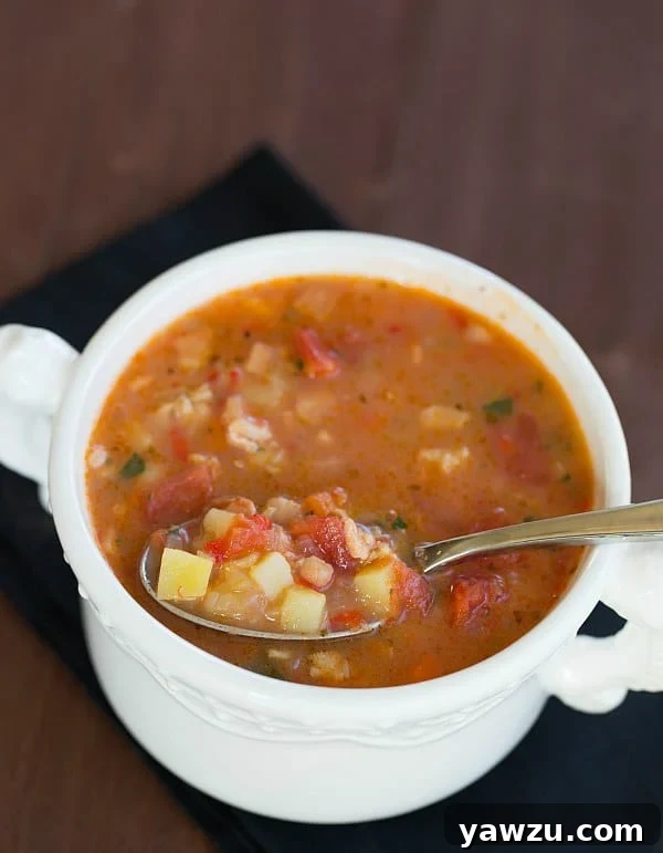 Close-up of a steaming bowl of Manhattan Clam Chowder