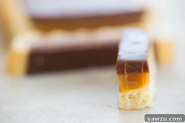 Serving slices of the homemade Twix Tart