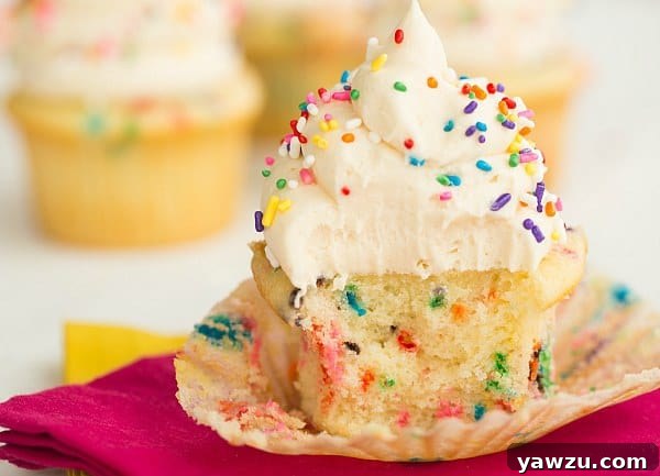 Assorted homemade Funfetti cupcakes on a decorative platter