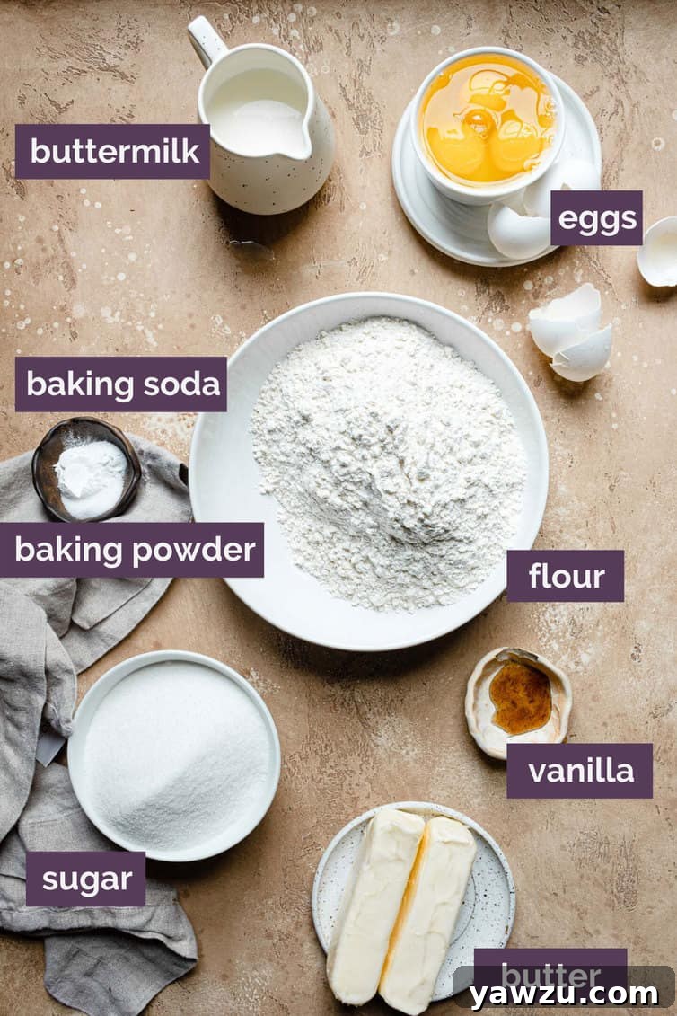Ingredients for butter cake prepped in bowls on counter, ready for mixing.