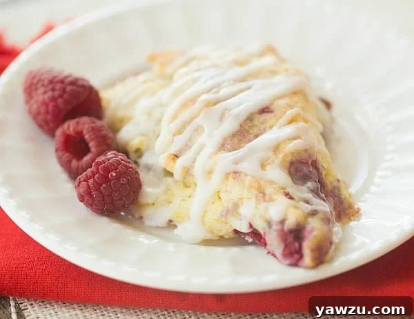 Display of various Meyer Lemon-Raspberry Scones on a cooling rack.
