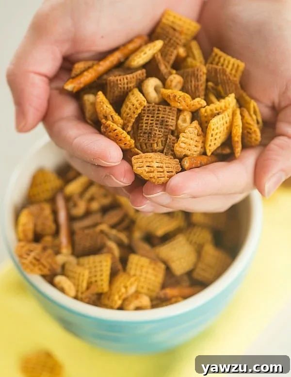 Assortment of cereals and nuts, main ingredients for Homemade Chex Mix.