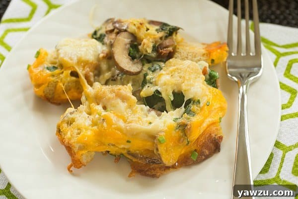 Close-up of golden brown Cheesy Bacon Strata with herbs