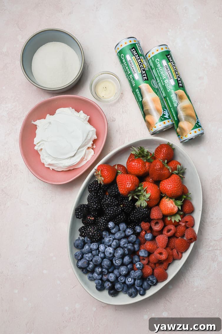 Ingredients for fruit pizza prepped on the counter.