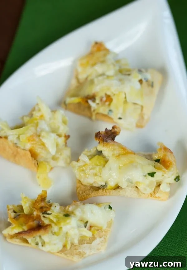Close-up of baked Artichoke-Fontina Dip with golden-brown topping