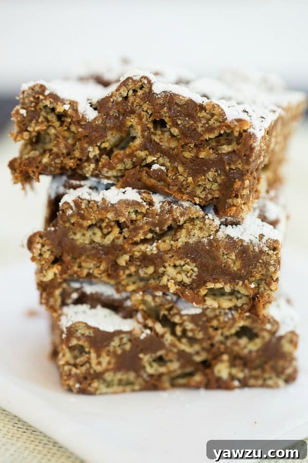 Muddy Buddy (Puppy Chow) Rice Krispie Treats | browneyedbaker.com #recipe