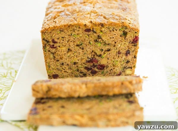 Another view of the Spiced Zucchini Bread, highlighting its golden-brown crust and inviting texture, ready to be sliced and enjoyed.