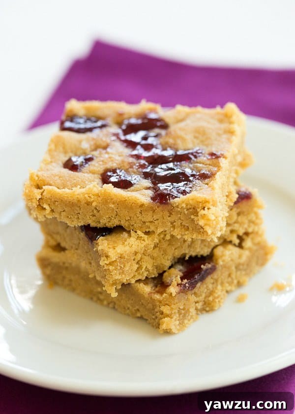 Close-up of Peanut Butter and Jelly Cookie Bars, showing the jelly swirl