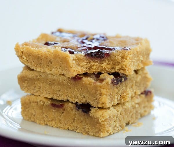 Sliced Peanut Butter and Jelly Cookie Bars ready for serving