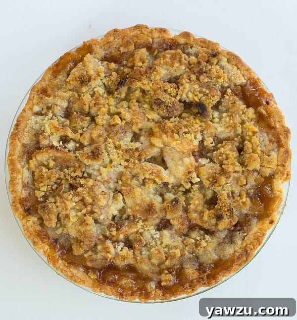 Delightful Maple-Apple Pie with Walnut Crumb Topping, a perfect fall dessert.