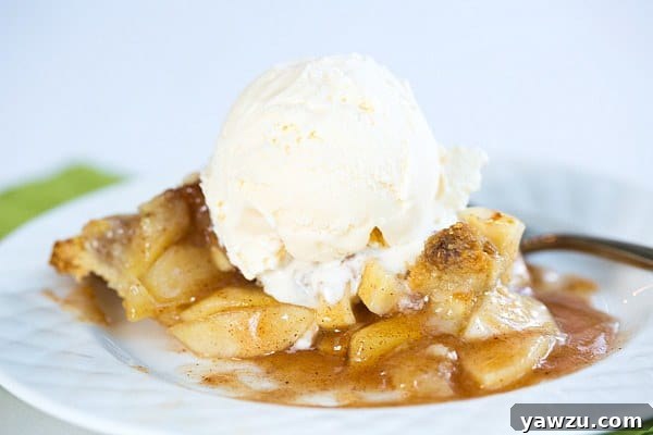 Close-up of the delicious walnut crumble topping on a maple-apple pie.