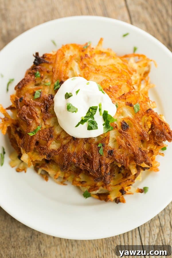 Crispy Potato Latkes: The ultimate homemade recipe for golden-brown perfection, ideal for Oktoberfest and Hanukkah.