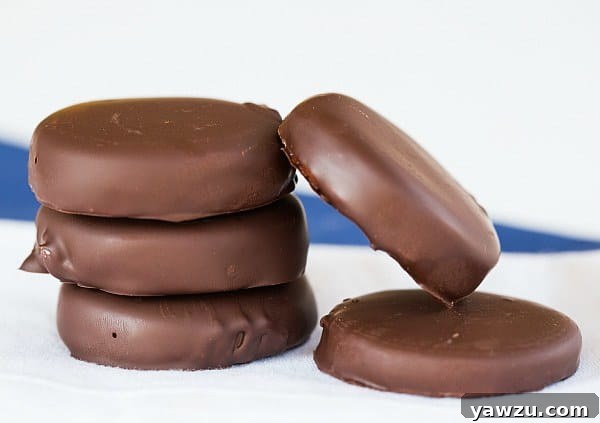 Glossy Dark Chocolate Coating on Homemade Peppermint Patties Setting Up