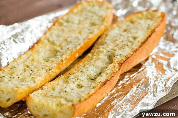 Homemade Cheesy Garlic Bread - Close-up of cheesy, melted topping
