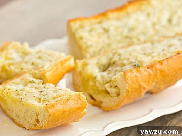 Homemade Cheesy Garlic Bread - Sliced and ready to serve