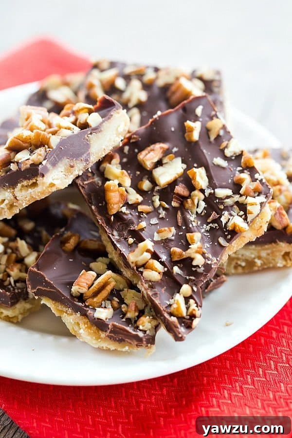 Saltine Toffee Candy with Pecans - An easy and delicious candy recipe! A perfect sweet and salty homemade treat.