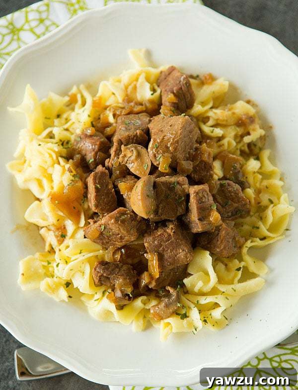 Slow Cooker Beef Tips with Mushrooms and Egg Noodles | browneyedbaker.com