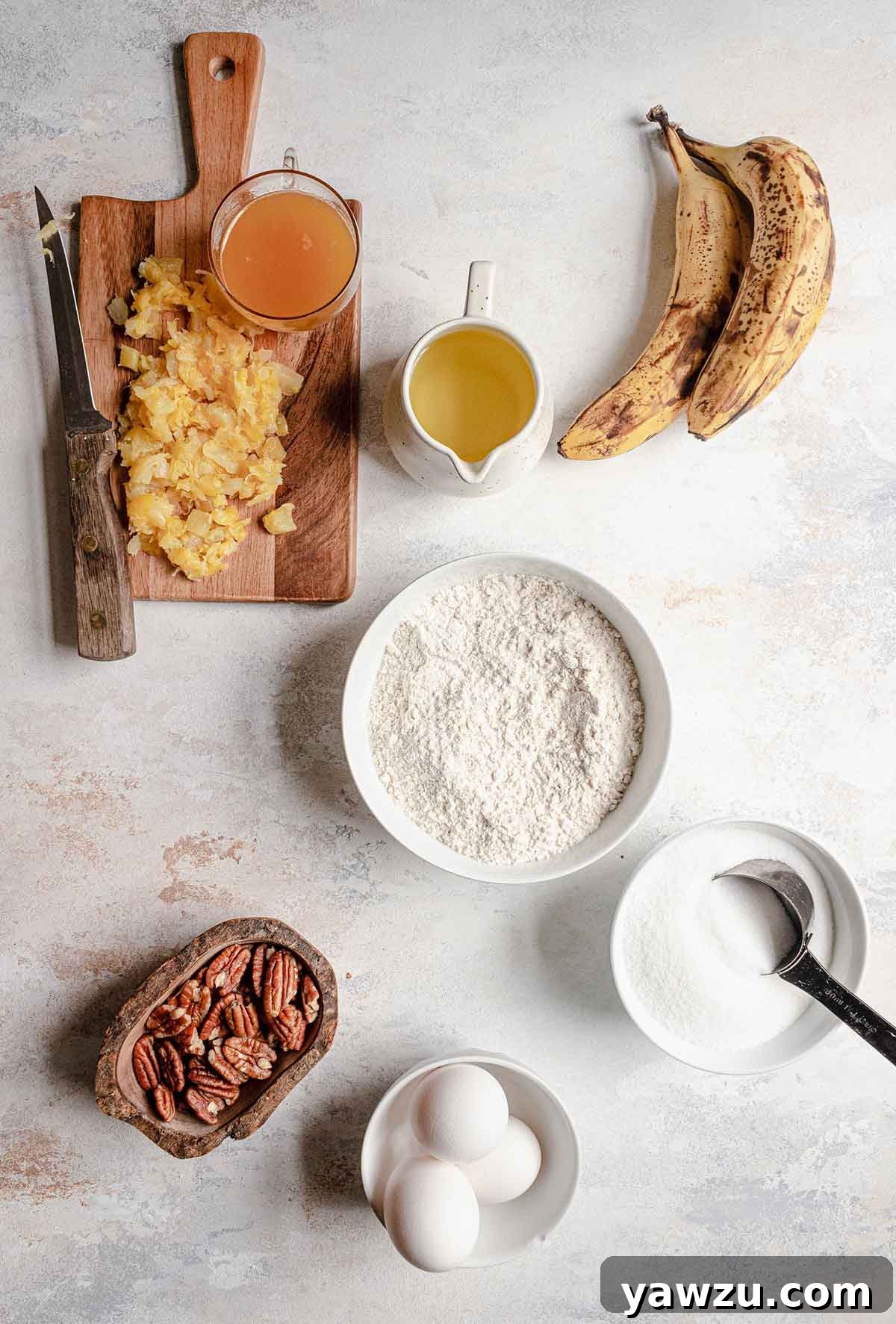 Ingredients for hummingbird cake prepped on a counter.