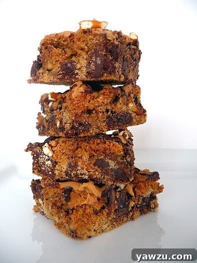 Stack of chocolate chip and pretzel cookie bars.
