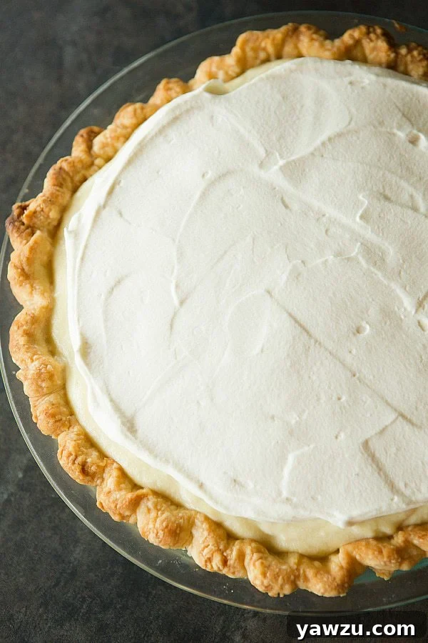 The ultimate homemade banana cream pie with banana-infused pastry cream and fresh whipped cream