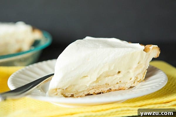 A beautifully presented banana cream pie, ready to be served