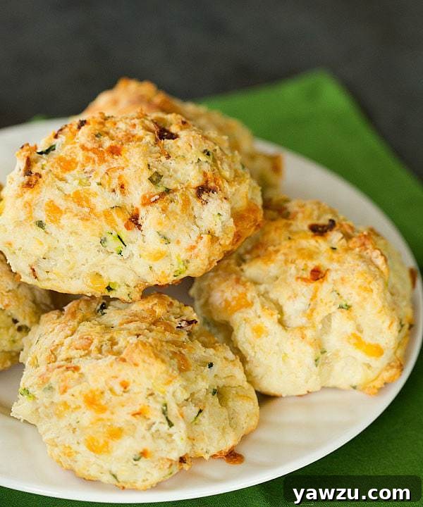 Delicious Cheesy Zucchini and Sun-Dried Tomato Scones, perfect for any meal.