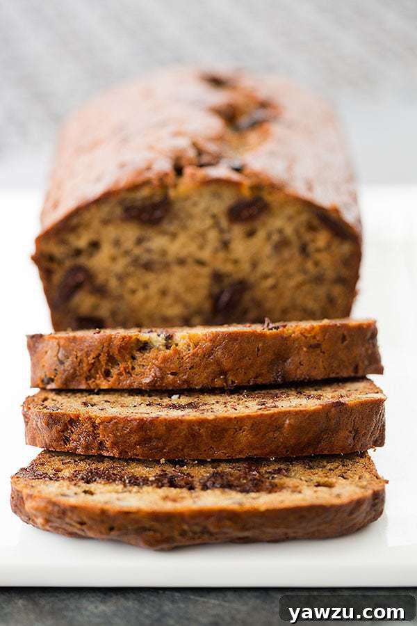 Sliced Dark Chocolate Chunk and Walnut Banana Bread showcasing its moist texture and delicious additions