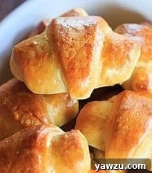 Homemade crescent rolls, golden brown and perfectly flaky.