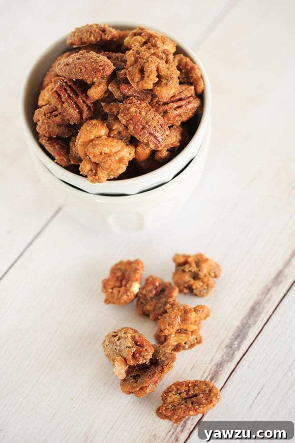 Delicious Sugar and Spice Candied Nuts displayed in a bowl