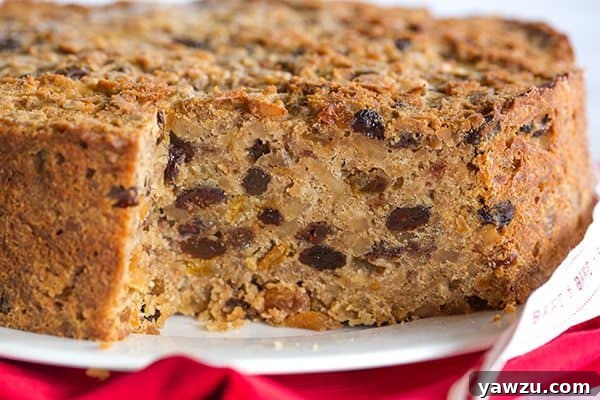 Christmas Cake - A wonderfully dense and moist fruit cake loaded with rum-soaked fruit!