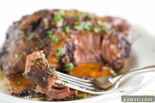 Slow Cooker Korean Short Ribs are the epitome of an easy, 'set it and forget it' meal, delivering an explosion of flavor and perfectly tender, fall-apart beef every time. A must-try recipe for comfort food lovers.