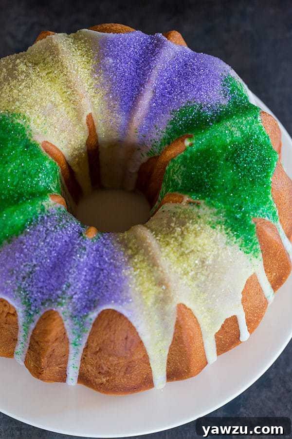 A close-up view of the interior swirl of the King Bundt Cake, showcasing the rich pecan, brown sugar, and cinnamon filling before decoration.