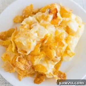 This easy potato casserole is creamy, cheesy and topped with crunchy Corn Flakes.