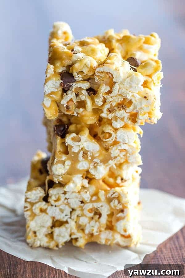 Gooey Peanut Butter & Marshmallow Popcorn Bars with chocolate chips