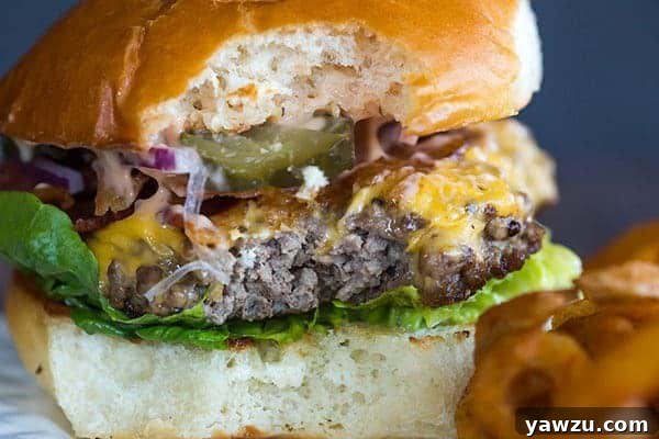 Cast Iron Skillet Cheeseburgers - They're tender, flavorful and never dry! You'll never want to make them on the grill again!