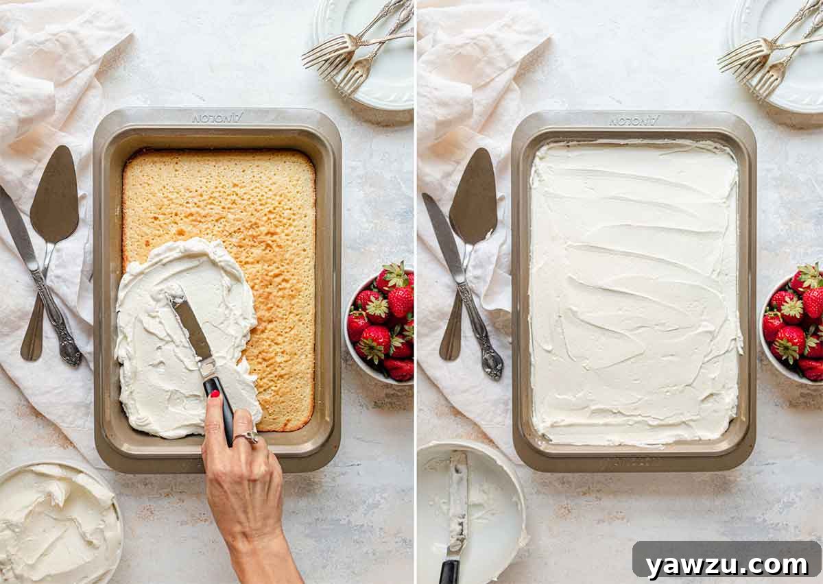 Topping tres leches cake with fresh whipped cream.