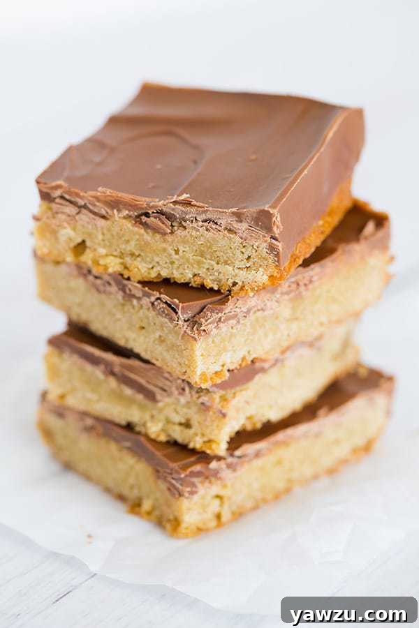 Symphony Bars - A freshly baked batch of blondies, topped with broken Symphony chocolate pieces, waiting for the warmth to melt them into a smooth layer.