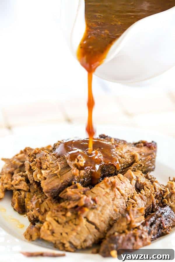 Slow Cooker BBQ Brisket cooked to perfection, incredibly easy to make with homemade sauce.