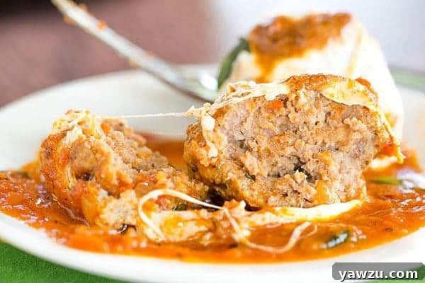 Skillet Meatball Parmesan: An easy skillet meal with awesome meatballs simmered in a tomato sauce and topped with lots of fresh mozzarella.