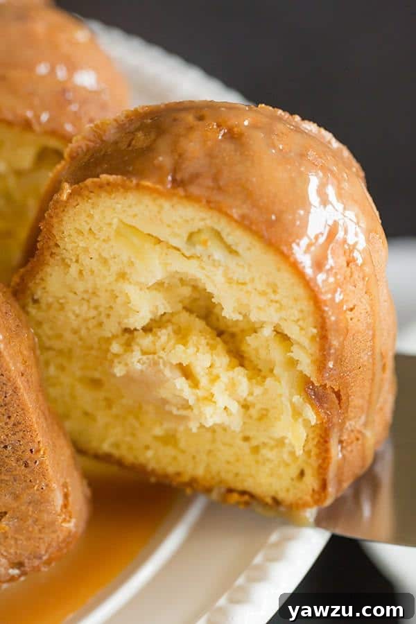 Caramel Apple Bundt Cake - An easy cake recipe baked up in a gorgeous Bundt pan, and topped with a perfect caramel glaze.