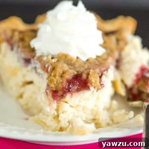 A beautifully baked Cranberry Cheesecake Crumb Pie, ready to be sliced and served.