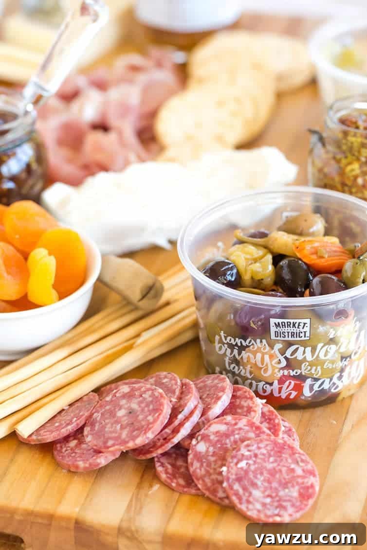 How to build an epic charcuterie board with diverse cheeses, cured meats, and delicious accompaniments. Perfect for any party or gathering. | browneyedbaker.com