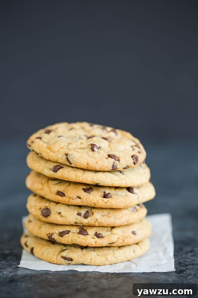 So many soft and chewy chocolate chip cookies in a big stack!