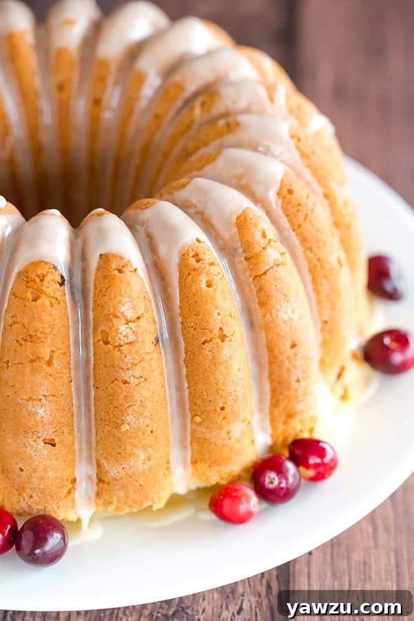 Moist Cranberry Pound Cake with Orange Glaze, perfect for Thanksgiving and holiday dessert tables.