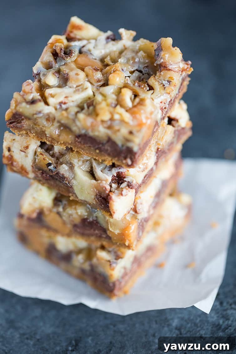 An inviting overhead view of a perfectly arranged stack of caramel apple magic bars.