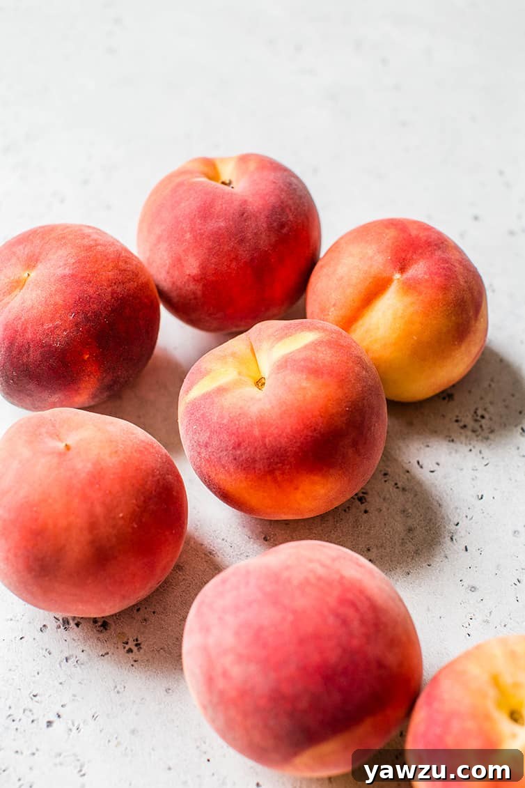 A basket of fresh, ripe peaches ready to be transformed into a delicious dessert.
